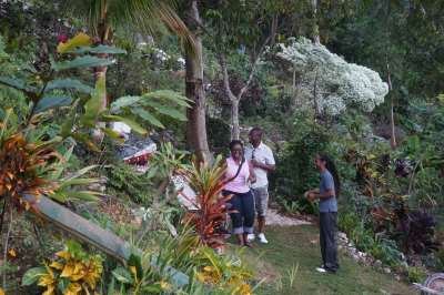 Ayale Williams with Canadian Travel Agents Vanessa and Patrick in the Garden